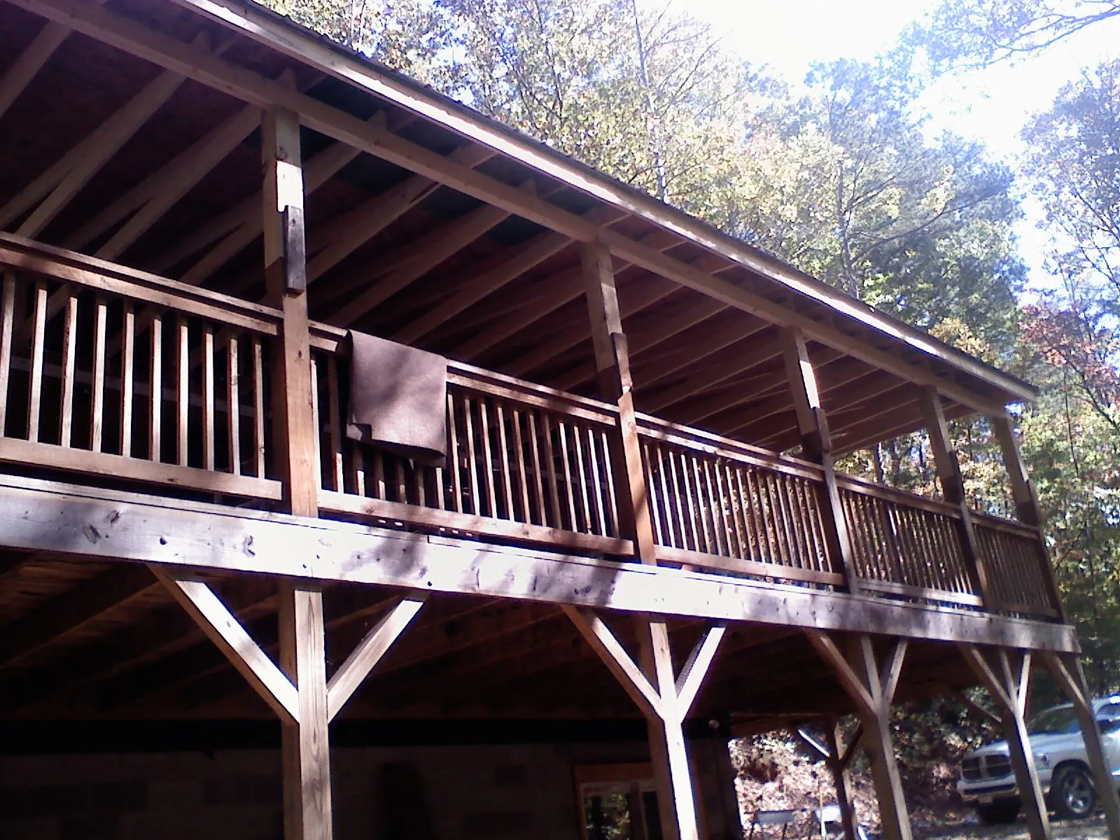 Timber framing under a new elevated porch and deck — Roof Leak Repair in Texarkana by Roofing Brothers